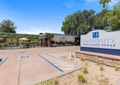 The front entrance sign to University Post Acute